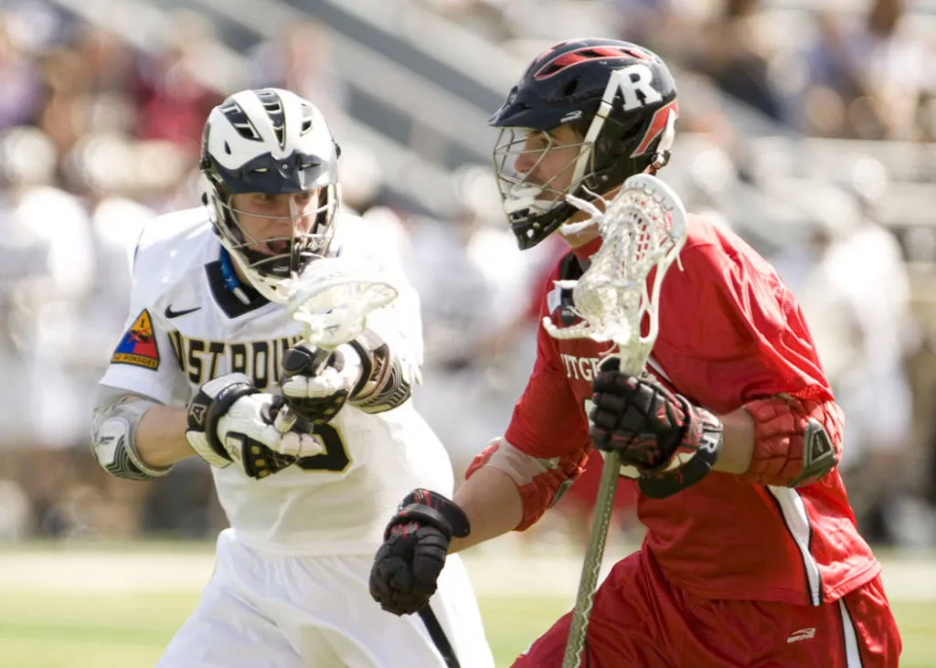 College lacrosse players competing during a game